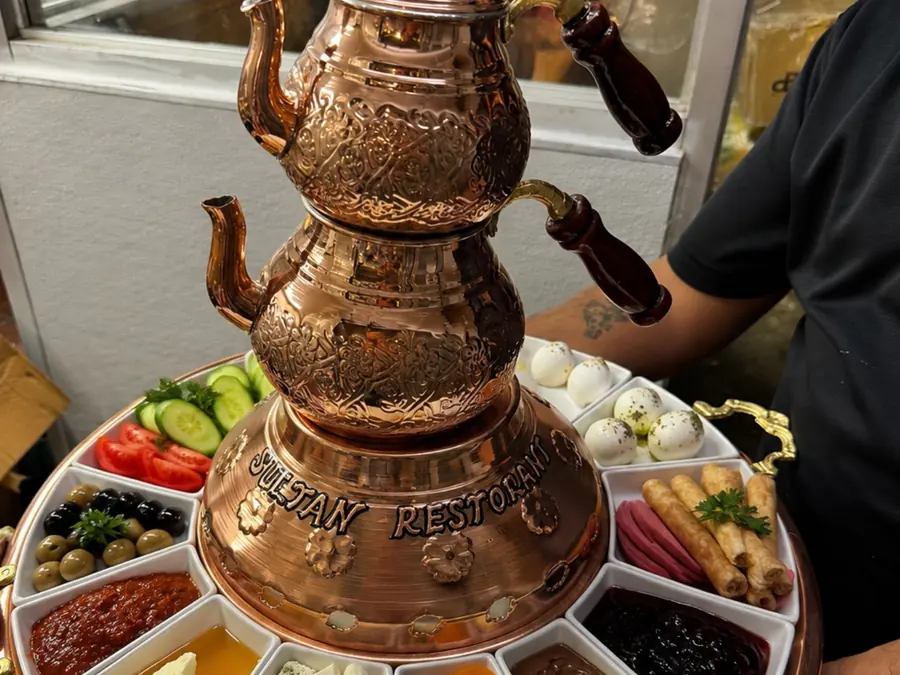 Turkish breakfast on the tiered copper stand